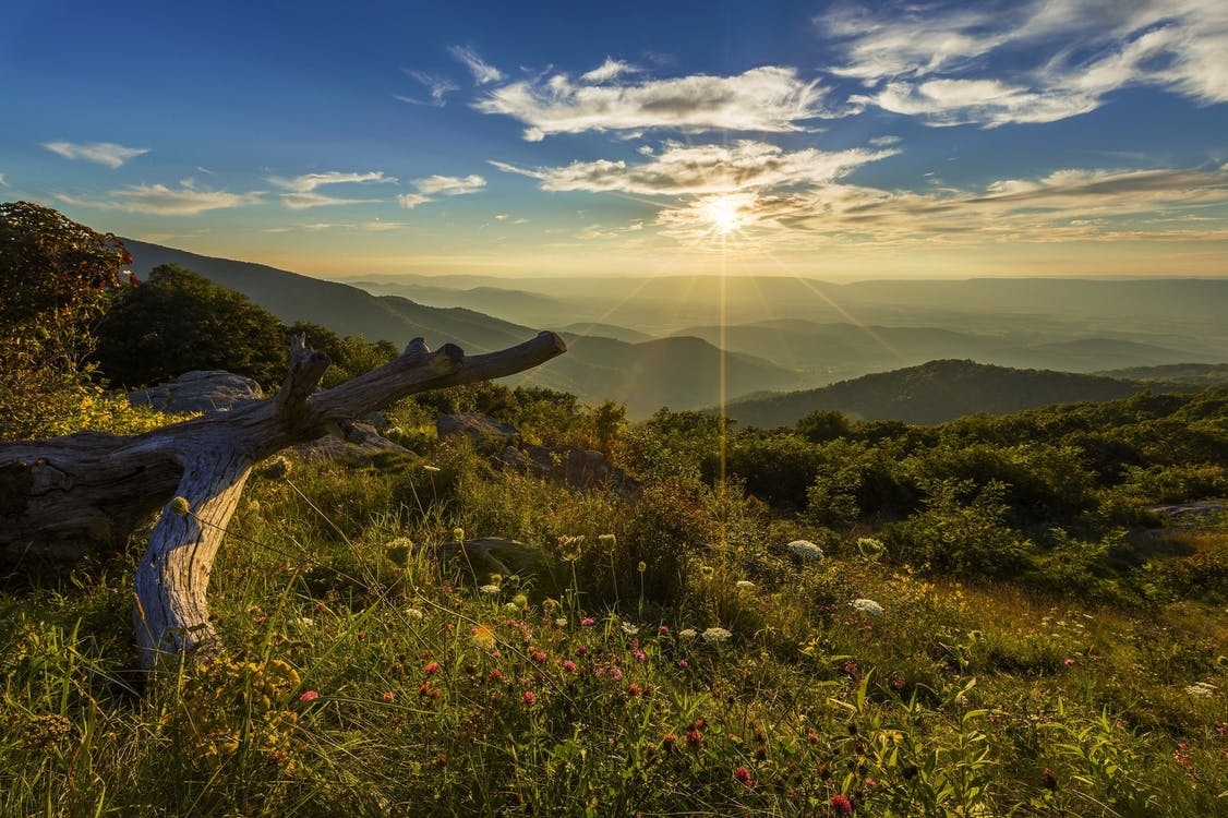 https://www.pexels.com/photo/mountain-view-during-sun-rise-under-blue-sky-photo-221341/