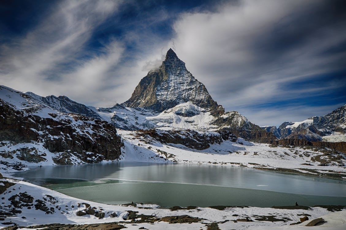 https://www.pexels.com/photo/adventure-alps-climb-clouds-267104/
