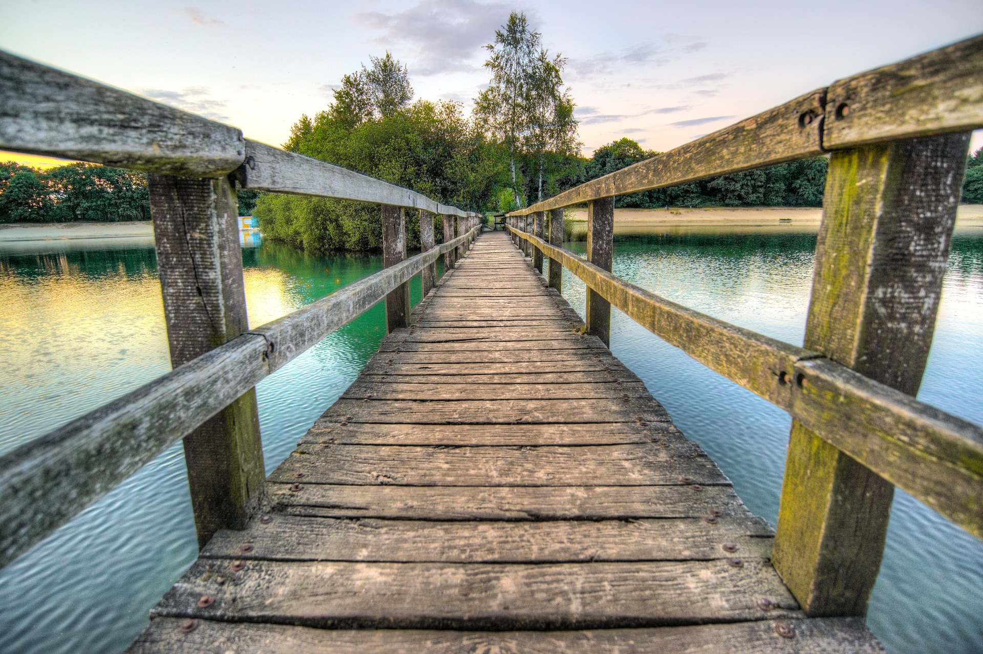 https://pixabay.com/en/bridge-sunset-water-lake-nature-2428777/