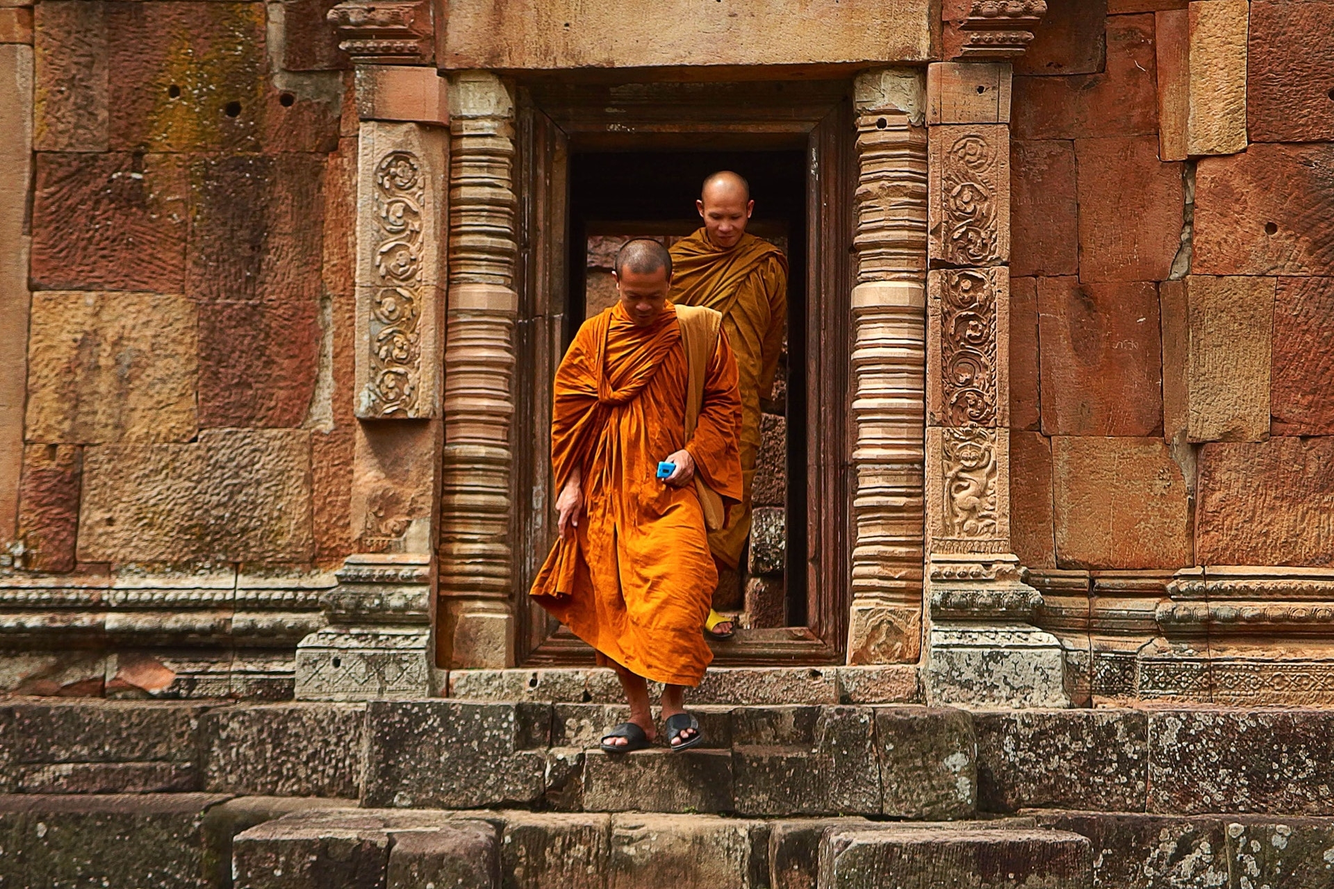 https://www.pexels.com/photo/two-monk-in-orange-robe-walking-down-the-concrete-stairs-161183/